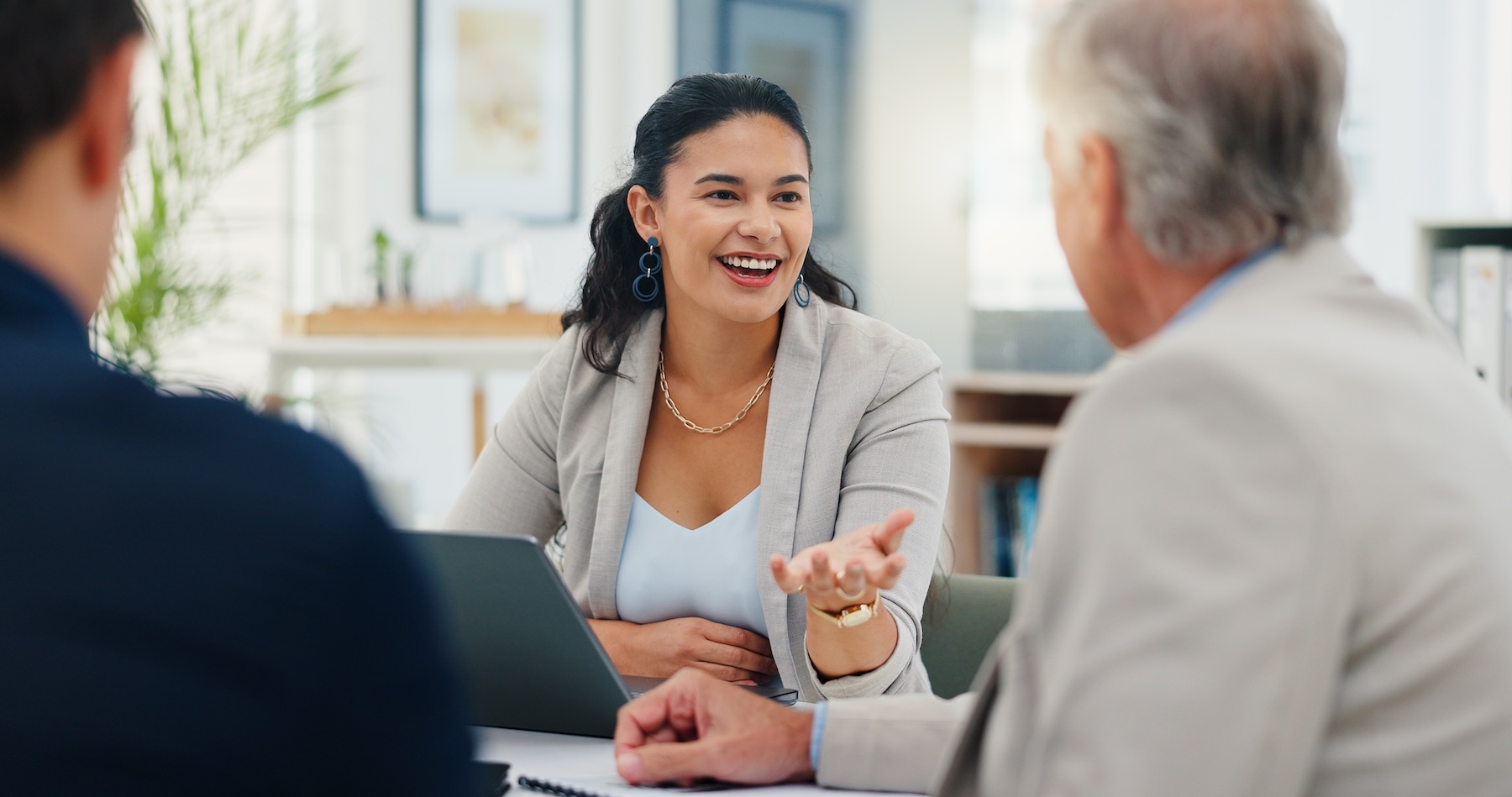 Small business owner discussing benefits.
